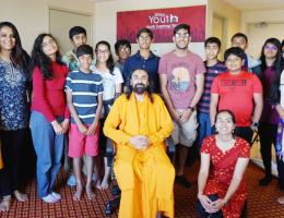 Swamiji lecturing at Universities